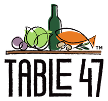 table 47 logo with black lettering and wine and food graphic